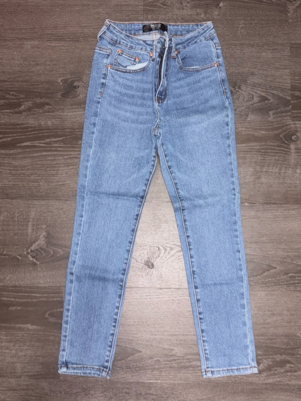High-Rise Slim Taper Jeans in Light Blue